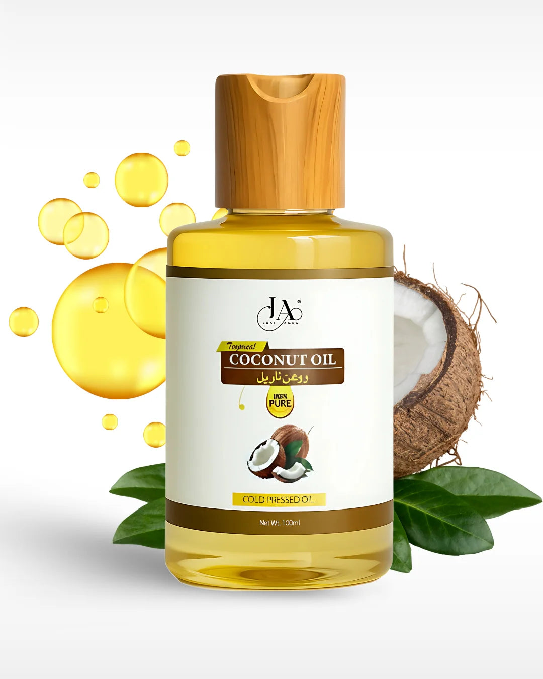 Just Amna coconut oil bottle with coconut and green leaves, 100ml cold-pressed