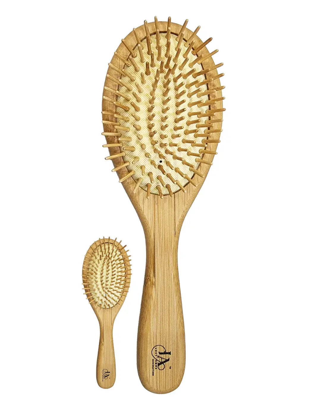 Front view of Just Amna bamboo hair brush showing natural wood bristles.
