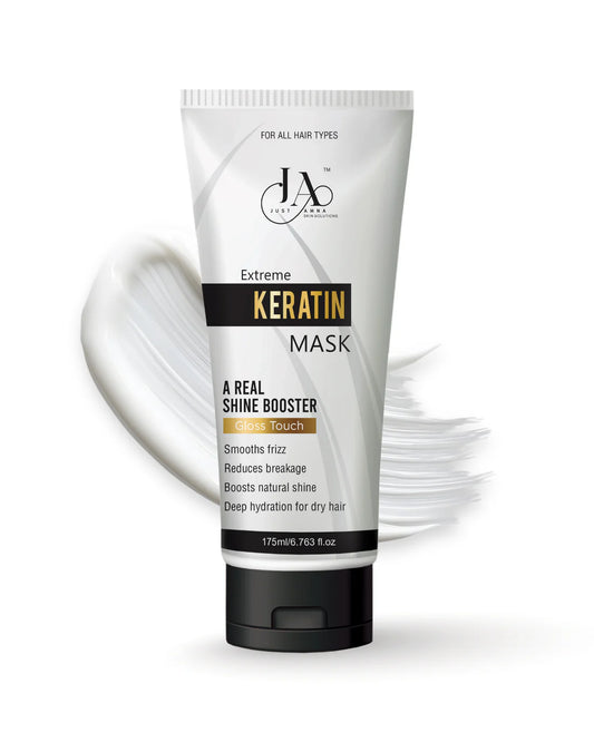 Just Amna Keratin Mask 175ml tube with product texture swatch.