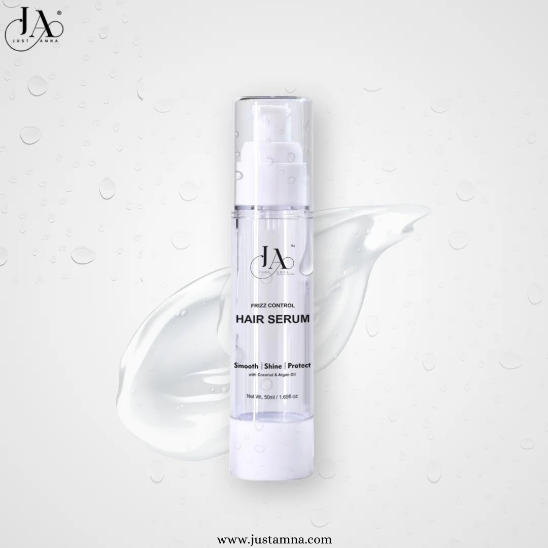 Just Amna smooth and shine hair serum bottle with liquid texture splash.