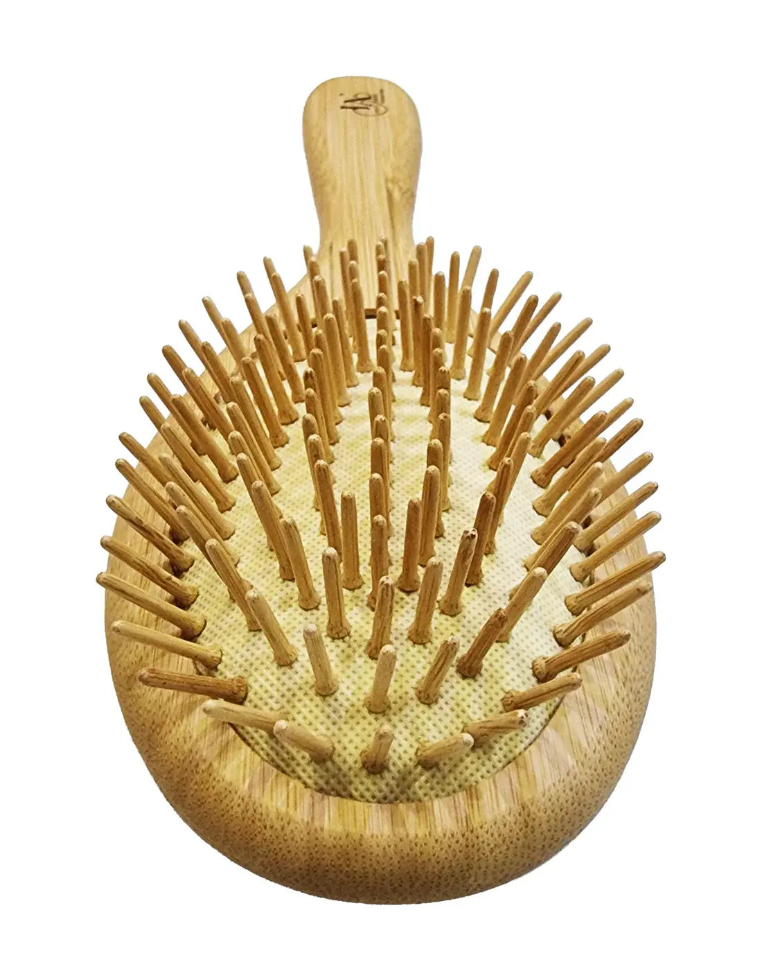Front view of Just Amna oval hair brush with scalp massaging bristles.