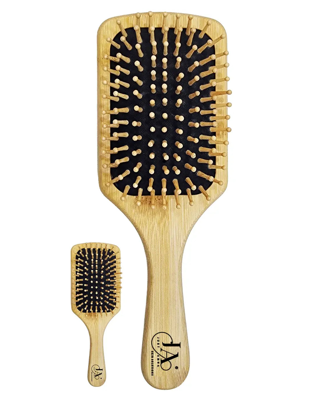 Large Just Amna bamboo paddle hair brush with wooden bristles.